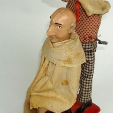 Парикмахер и клиент Фернана Мартина в действии (1900-е гг.)