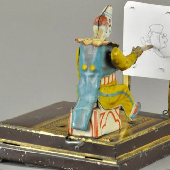 Механическая игрушка - художник