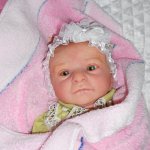 Нарядов много не бывает...одеваю своих реборняток :)