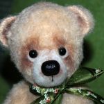 Мишка Лева - игрушка вязанная крючком