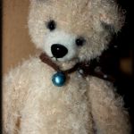 Мишка Бастиан - игрушка вязанная крючком