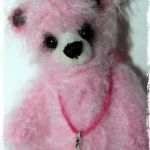 Микро мишка, игрушка вязанная крючком