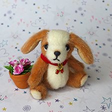 Миниатюрная собачка