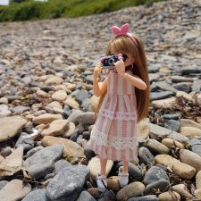 Юми в роли фотографа