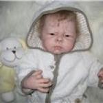 Белый медвежонок Илюшенька