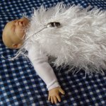 Предновогодний малышок. Куколка из пластики