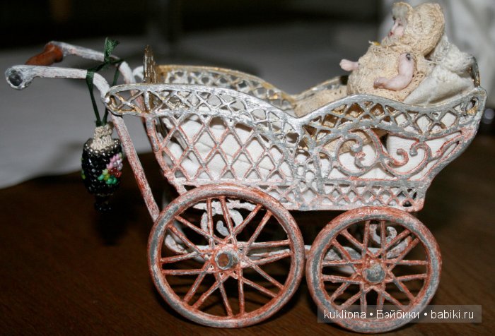 Антикварные и старинные кукольные коляски