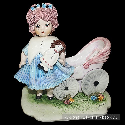 Антикварные и старинные кукольные коляски