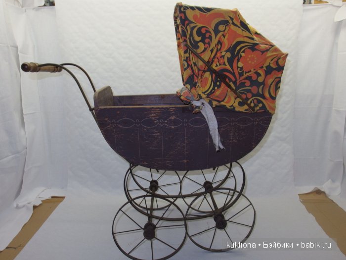 Антикварные и старинные кукольные коляски