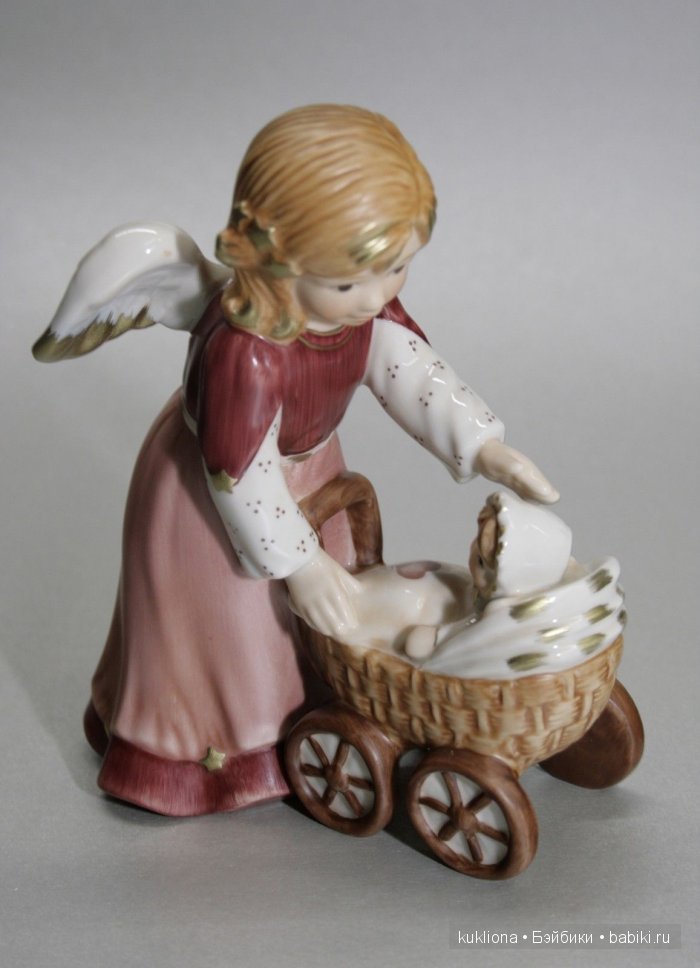 Антикварные и старинные кукольные коляски