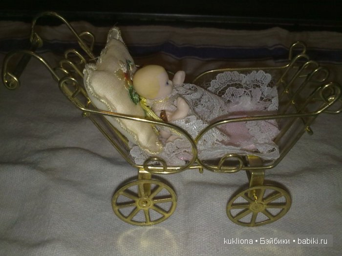 Антикварные и старинные кукольные коляски
