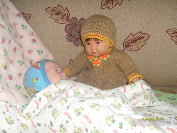 В костюмчике