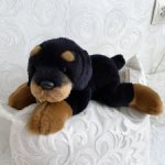 Реалистичный щенок ротвейлера