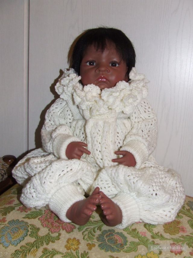 Дитя в комбинезоне