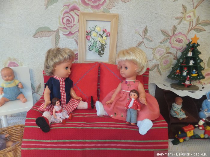 На диване, сидят вдвоём