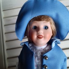 Прелестная фарфоровая куколка  Thursday Child