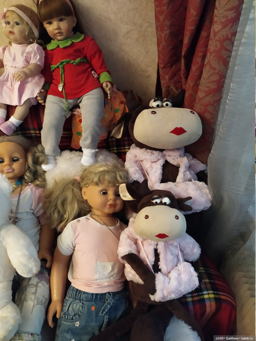 корова