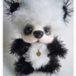 Панда. Вязаная игрушка крючком