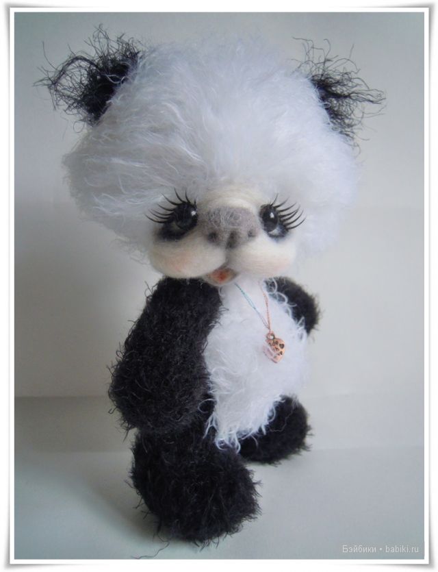 Пандочка - игрушка вязанная крючком (фото 2)