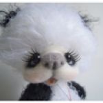 Пандочка - игрушка вязанная крючком