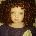 Фарфоровая кукла в подарок дочери на день рождения