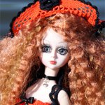 Озорной апельсин. Вязаный комплект для куклы.