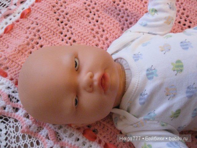 кукла с закрытыми глазами