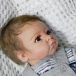 Андрюшенька серьезный мальчишка реборн