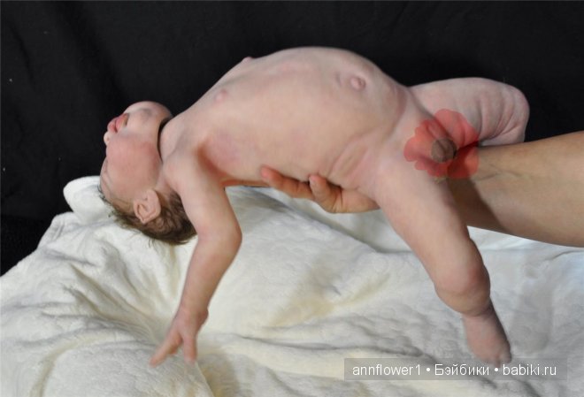 Почти живой силиконовый ребенок (фото 10)