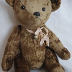 Медведь плюшевый