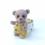 Розовый малыш мишка Тедди.