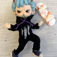 Карманный малыш-скейтбордист от Penny Doll