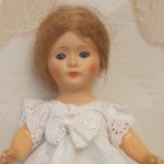 Старинная куколка из папье-маше