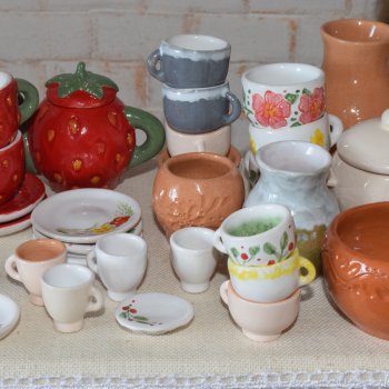 Новая партия посуды. Разгружаю печку