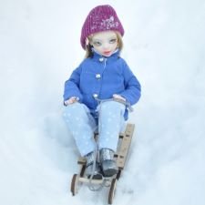 На саночках