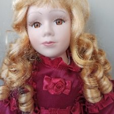 Фарфоровая кукла 40 см в Бордовом платье