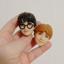 Головы Гарри и Рона лотом