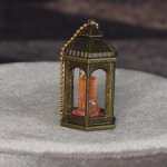 Бронзовый фонарь с оранжевым кристаллом