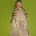 Фарфоровый пупсик с рельефными волосами, высота 8 см