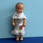 Резиновый пупсик с рельефными волосами, высота 11,5 см