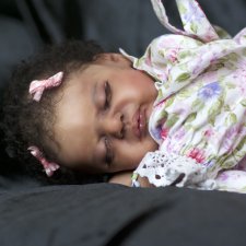 Темнокожая сплюшечка Америкус