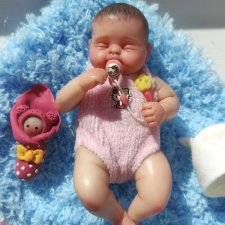 Куколка младенец