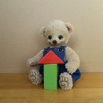 Мишутка, игрушка вязанная спицами