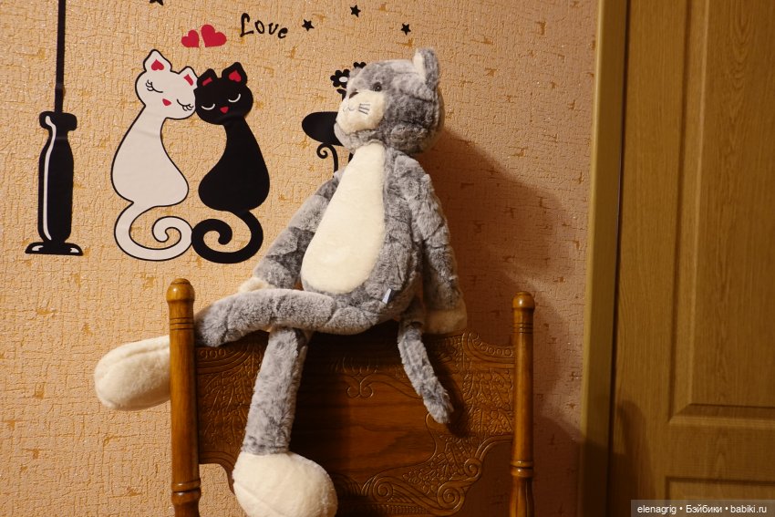 кот плюшевый
