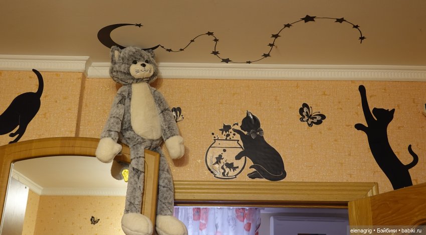 кот плюшевый
