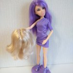 Куколка Лив в фиолетовом с двумя париками.