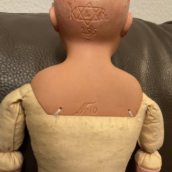 Помогите разобраться, что это за кукла?