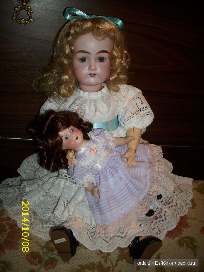 Мария с куклой