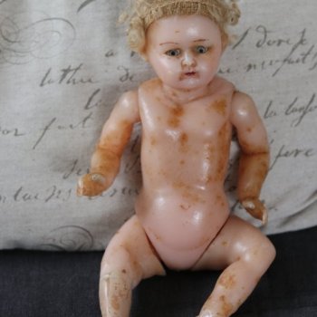 Реставрация цельнолитой восковой куклы