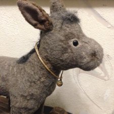 Игрушка Ослик каталка на колесах Игрушка Ослик каталка на колесах